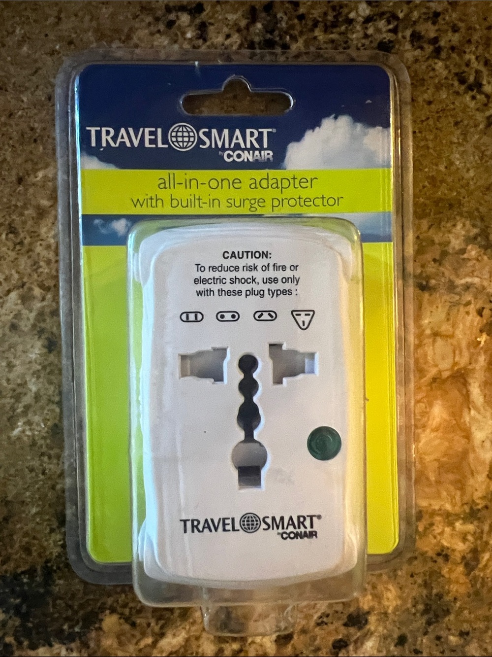 White All-in-One Travel Adapter with Surge Protection
